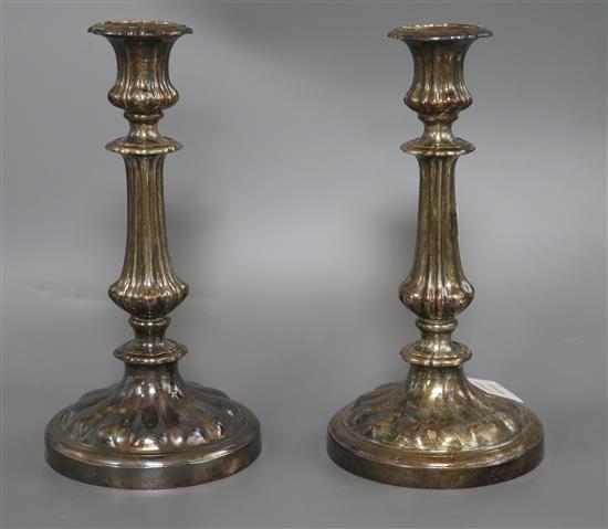 A pair of Sheffield plate candlesticks height 28cm